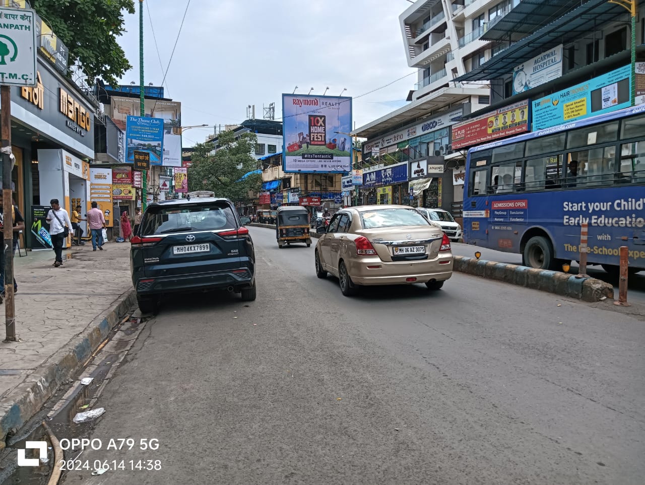 opp Vaman Hari Pethe hoarding